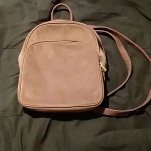 A backpack purse velvety texture